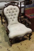 Victorian walnut shaped back open armchair with serpentine front seat on cabriole legs