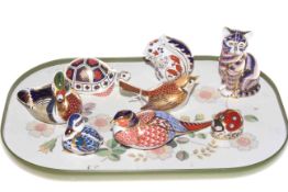 Collection of eight Royal Crown Derby paperweight including birds, cat,