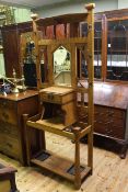 Late 19th Century/early 20th Century medium oak mirror back hallstand,