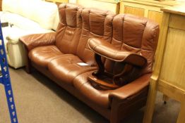 Ekornes Stressless leather three seater reclining settee and footstool