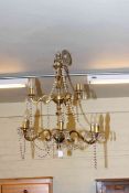 Brass lustre drop nine branch two tier ceiling light and brass standard lamp and shade