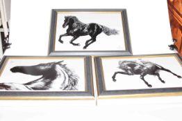 Three Royal Crown Derby black and white horse plaques,