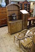 Set of four Ercol elm kitchen chairs together with an oak dome top dresser