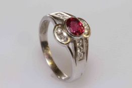 18 carat gold, oval ruby and brilliant cut diamond ring,