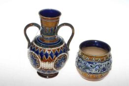 Doulton Lambeth two-handled vase and a Doulton Lambeth vase moulded with fish (2)