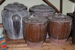 Four large stoneware lidded crocks