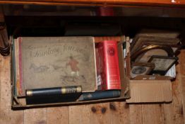 Two boxes of books and pictures including hunting books