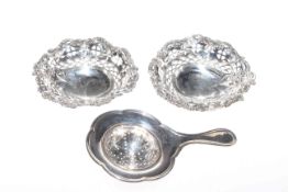 Pair of Victorian silver bon bon dishes and a silver tea strainer (3)