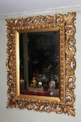 Rococo style gilt mirror,