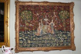 Large period style woolwork picture in a foliate moulded gilt frame,