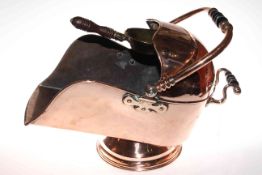 Highly polished copper coal scuttle with integrated brass shovel