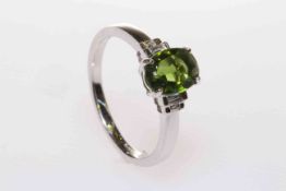 18 carat gold, oval green tourmaline and baguette diamond shoulder ring,