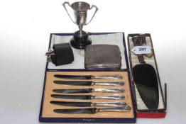 Silver cigarette case, six silver-handled knives, silver trophy,