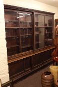 Late 19th/early 20th Century sliding door cabinet bookcase with adjustable shelves,