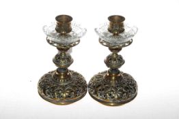Pair of Victorian brass candlesticks with glass drip pans,