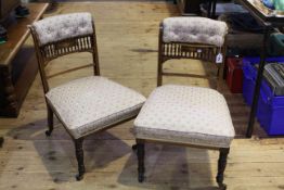 Pair Victorian rosewood and satinwood inlaid nursing chairs on turned legs