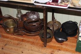 Collection of brass and steel pans, wooden bowls, oil lamp,