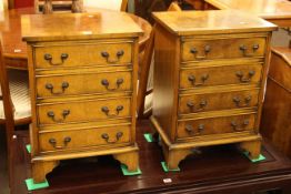 Pair Georgian style walnut four drawer pedestal chests