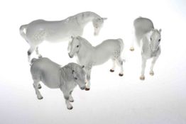 Four Beswick grey horse models