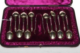 Set of twelve silver gilt apostle spoons and tongs, cased,