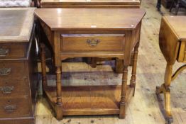 Bevan Funnell Reprodux canted corner single drawer hall table with undershelf and turned supports,