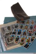 WWII stamps, cigarette cards, cap,
