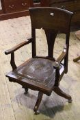 Early 20th Century swivel desk chair with studded leather seat