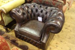Brown leather deep buttoned and brass studded Chesterfield chair