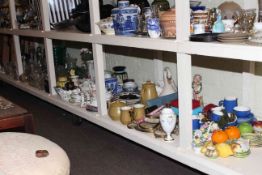 Full shelf of china and glass including decanters, bowls, toilet jug and bowl, plates,