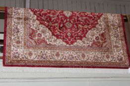 Keshan carpet with a red ground 2.80 by 2.