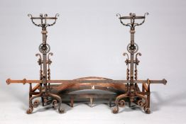 A PAIR OF 19TH CENTURY ANDIRONS, CIRCA 1870, decorated with flowerheads, with arched grate.