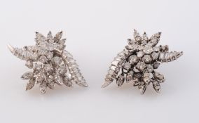 A PAIR OF DIAMOND SET EARRINGS, of floral and foliage spray design,