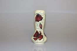 A MOORCROFT "CHOCOLATE COSMOS" VASE, first quality.