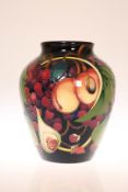 A MOORCROFT "QUEENS CHOICE" VASE, first quality.