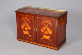 AN INLAID MAHOGANY TABLE CABINET, with pierced brass gallery, inlaid with musical trophies.