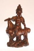 A CHINESE CARVED WOOD FIGURE OF GUANYIN, probably 19th Century,