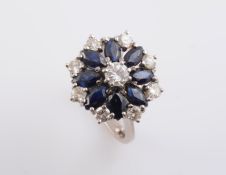 A SAPPHIRE AND DIAMOND RING,