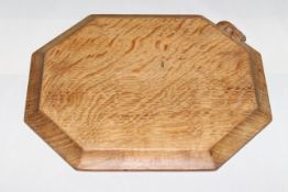 ROBERT THOMPSON OF KILBURN A MOUSEMAN OAK BREADBOARD, of typical form, carved mouse signature. 30.