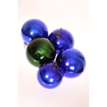 A COLLECTION OF FIVE VICTORIAN WITCHES BALLS, comprising three large blue,