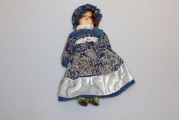 A KAMMER & REINHARDT CELLULOID DOLL, no. 406/34, with jointed body.