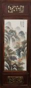 A PAIR OF CHINESE PORCELAIN PLAQUES, each painted with a waterfall in a landscape, in wooden frames.