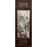 A PAIR OF CHINESE PORCELAIN PLAQUES, each painted with a waterfall in a landscape, in wooden frames.