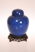 A CHINESE BLUE GLAZED GINGER JAR AND COVER, probably 19th Century, the base with concentric circles,
