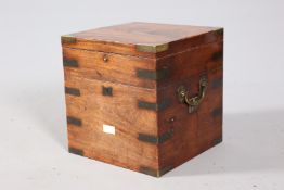 A GEORGE III BRASS BOUND MAHOGANY CELLARETTE, square with brass carrying handles, altered.