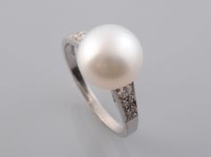 A FRESHWATER PEARL AND DIAMOND RING,
