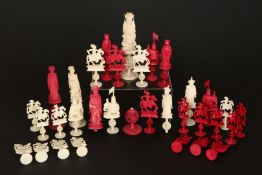 A CHINESE EXPORT IVORY CHESS SET, CIRCA 1900, in natural ivory and stained red,