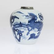 A CHINESE BLUE AND WHITE "KYLIN" JAR, OF TRANSITIONAL TYPE, ovoid form,