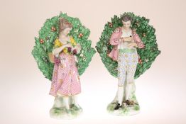 A LARGE PAIR OF CHELSEA STYLE BOCAGE FIGURES, CIRCA 1900,