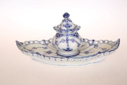 A ROYAL COPENHAGEN BLUE AND WHITE PORCELAIN INKWELL, with pierced border and foliate decoration.