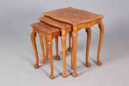 A SET OF THREE BURR WALNUT NESTING TABLES, CIRCA 1920's/30's,